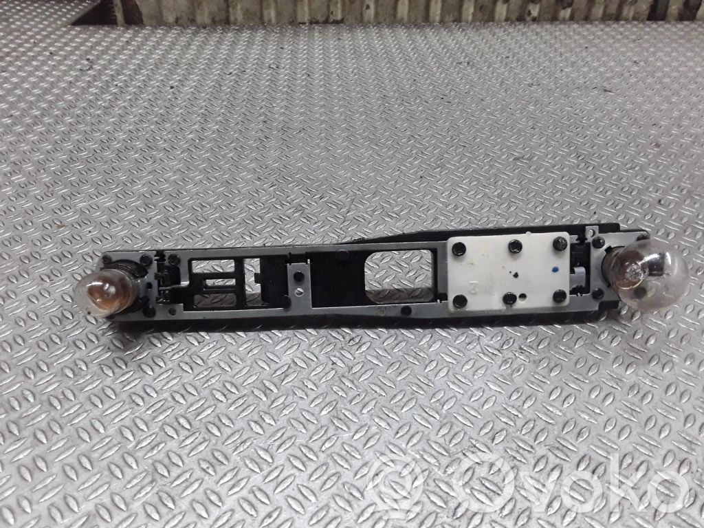 Citroen C5 Takavalon polttimon suojan pidike 