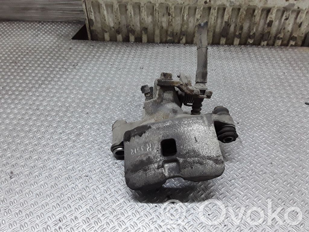 Toyota Corolla E110 Pinza del freno posteriore