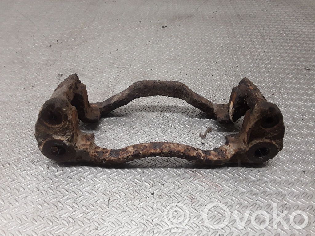 Plaquette / support d'étrier avant