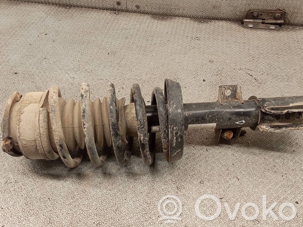 Front shock absorber with coil spring