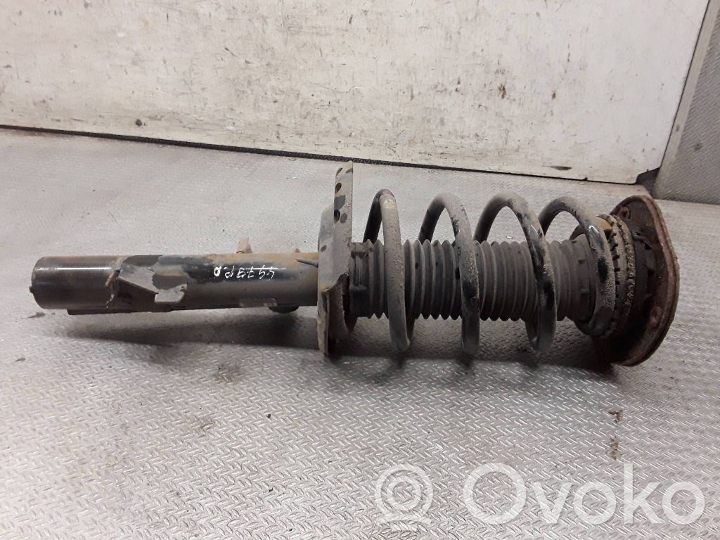 Front shock absorber with coil spring