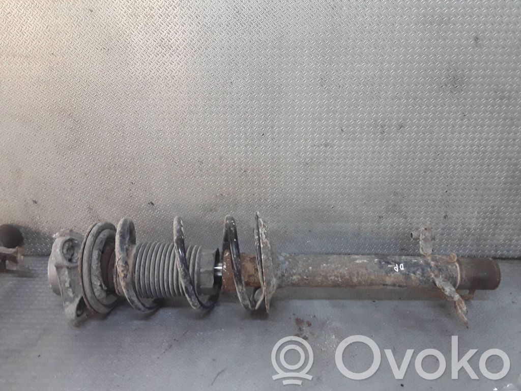 Front shock absorber with coil spring
