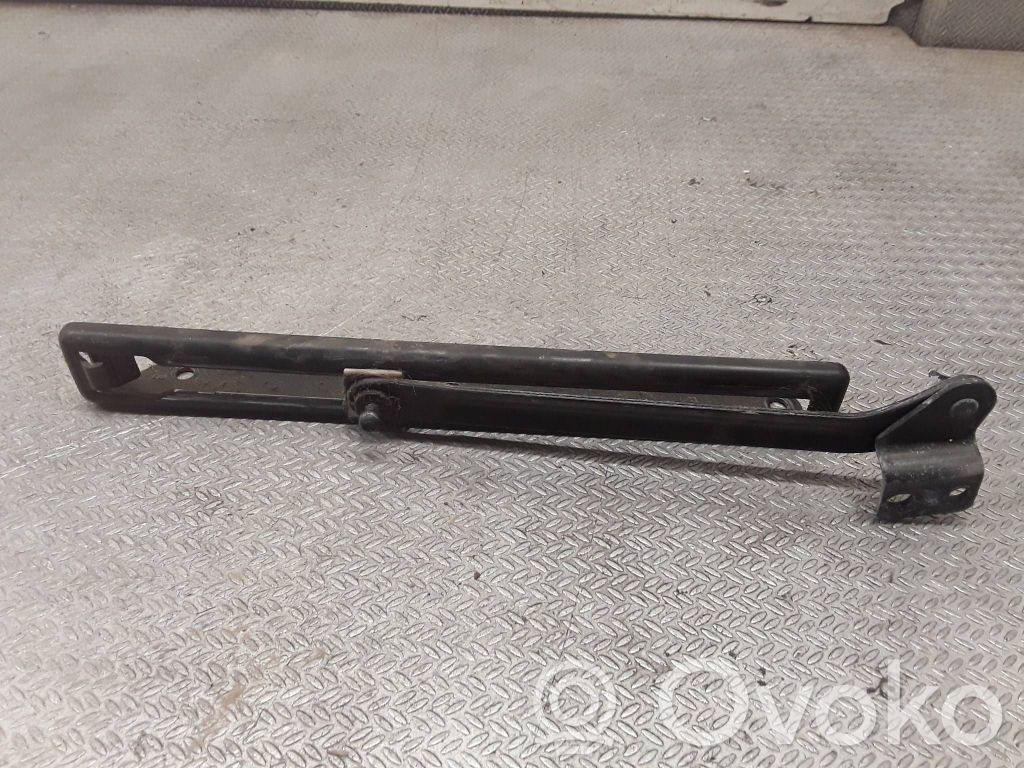 Loading door check strap stopper