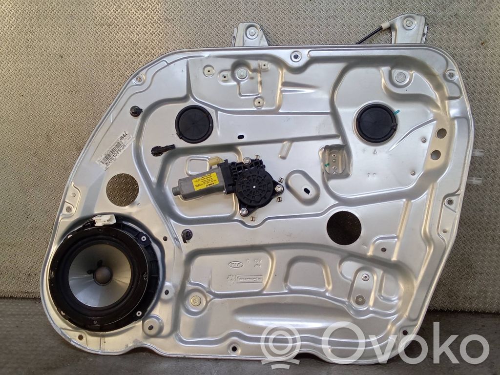 KIA Carens II Regulador de puerta delantera con motor