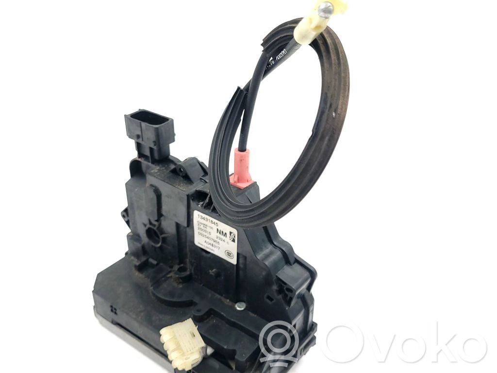 Opel Corsa E Zamek drzwi tylnych 