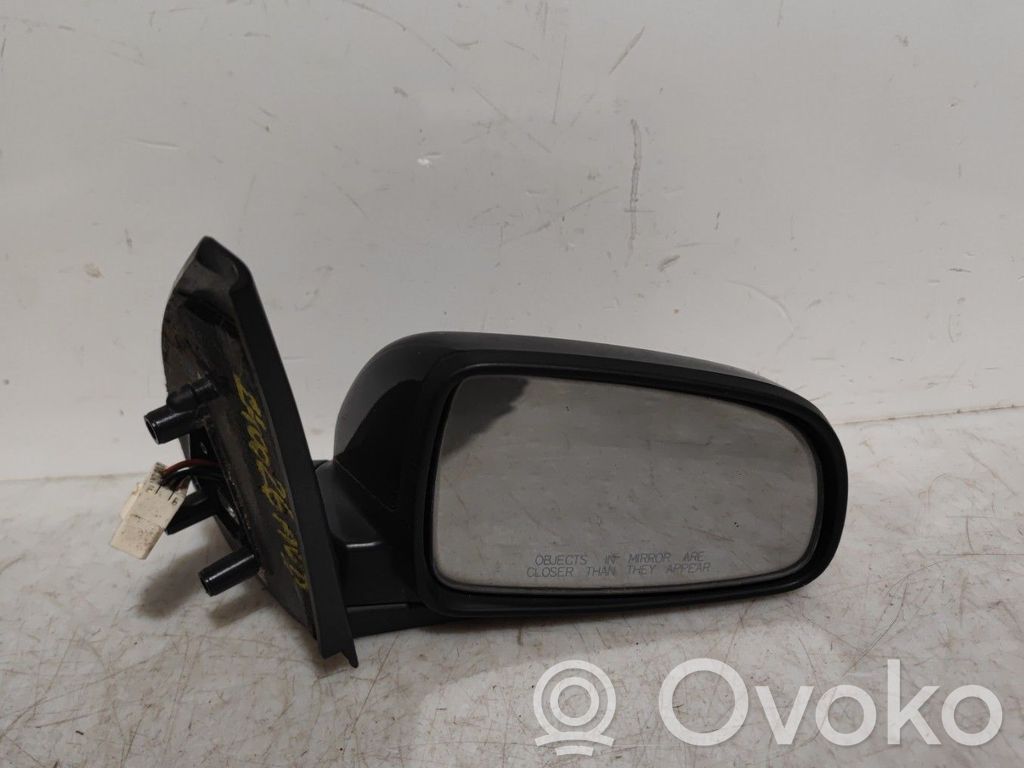 Chevrolet Aveo Espejo lateral manual 