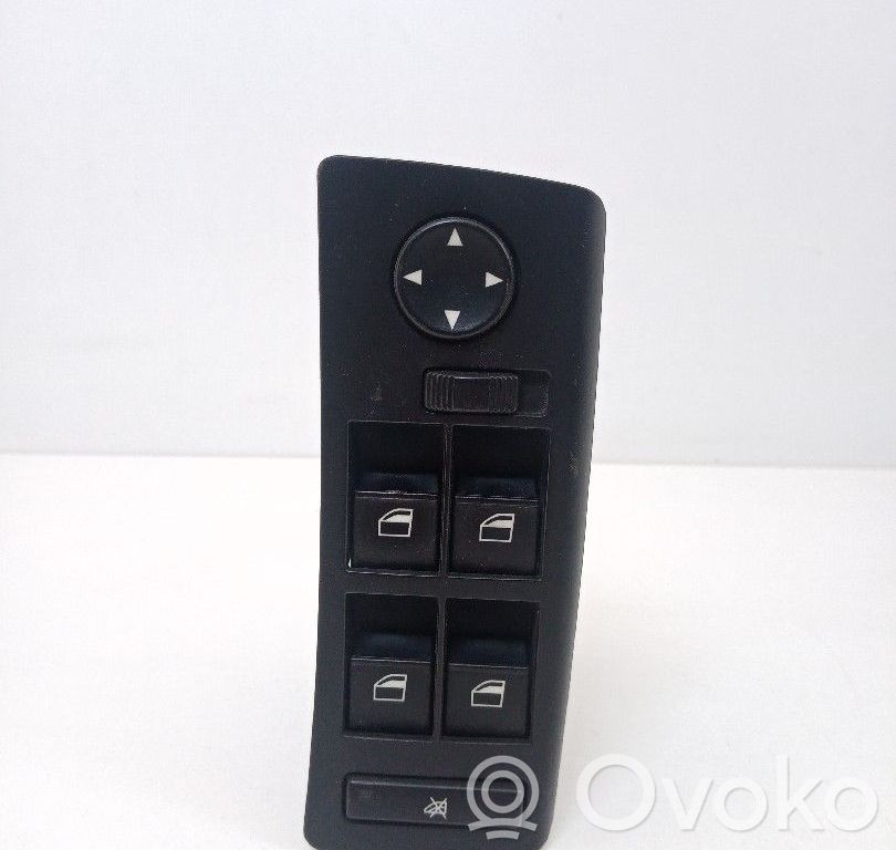 Electric window control switch   6952795