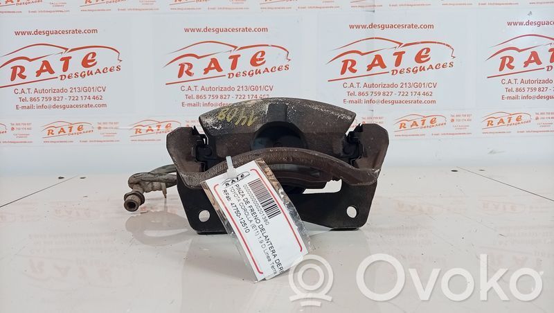Toyota Corolla E110 Zacisk hamulcowy przedni 