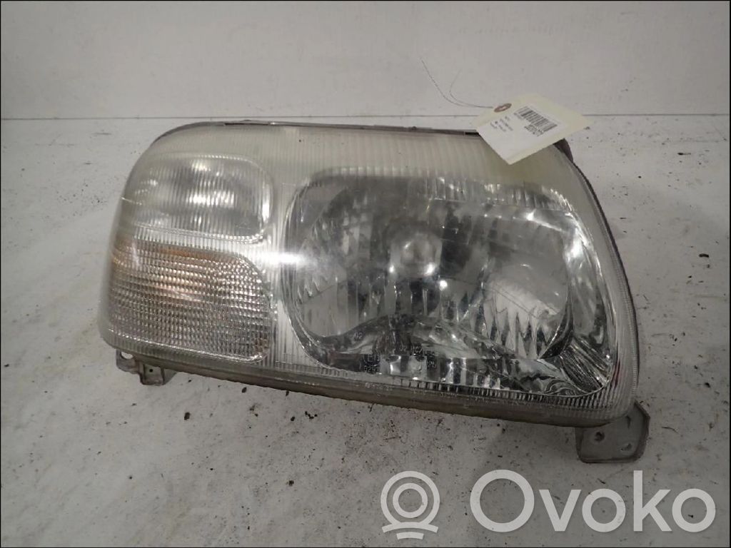 Suzuki Grand Vitara I Lampa przednia 
