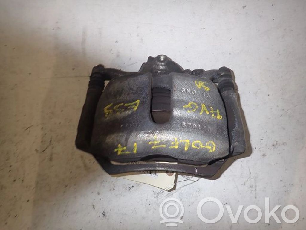 Volkswagen Golf VII Zacisk hamulcowy przedni 