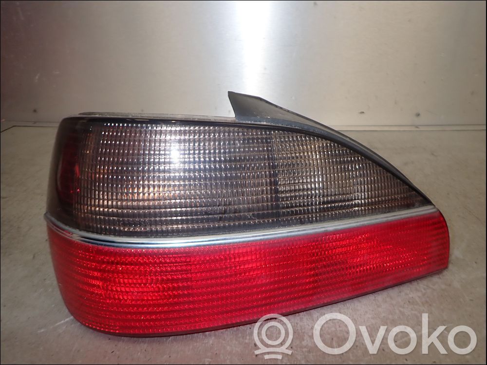 Peugeot 306 Galinis žibintas kėbule 