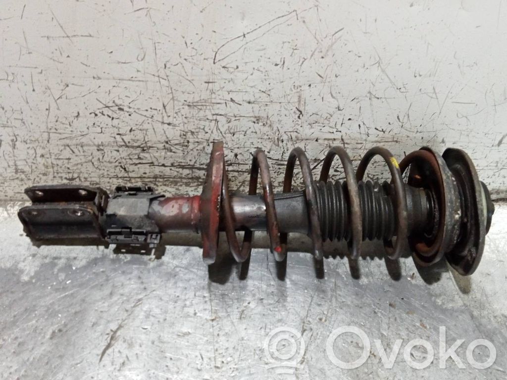 Front shock absorber with coil spring