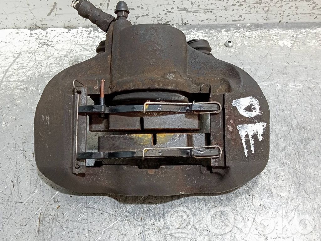 Caliper de freno delantero