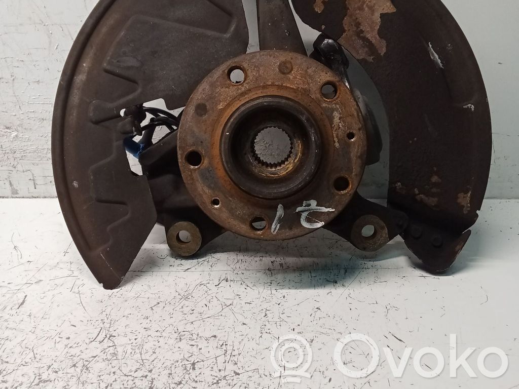 Front wheel hub spindle knuckle