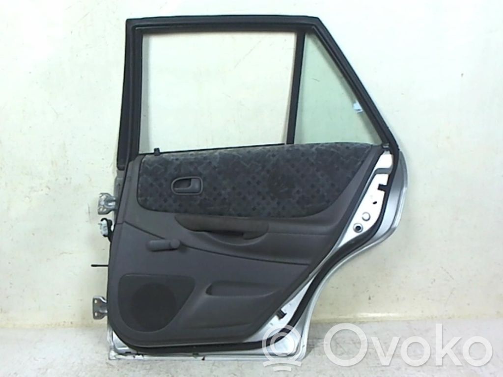 Mazda 323 Galinės durys 