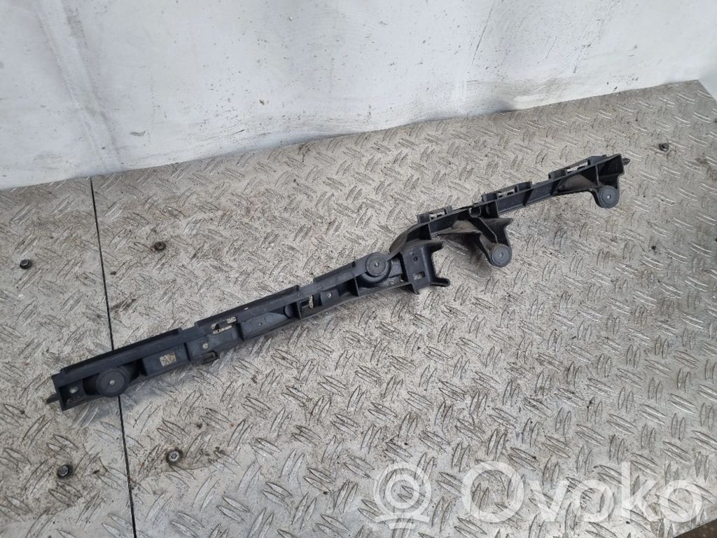 Opel Astra H Uchwyt / Mocowanie zderzaka tylnego 
