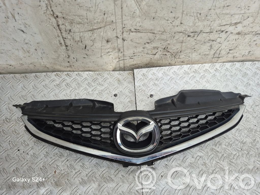 Mazda 5 Front bumper upper radiator grill 