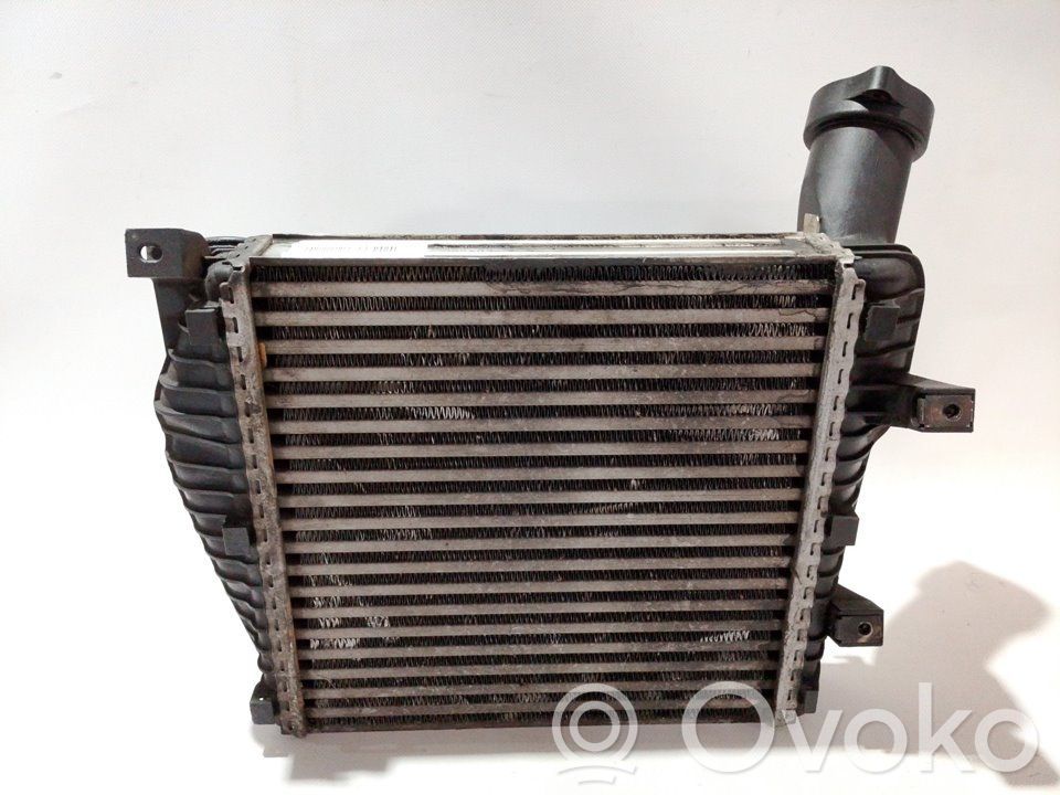 Volkswagen Touareg I Chłodnica powietrza doładowującego / Intercooler 