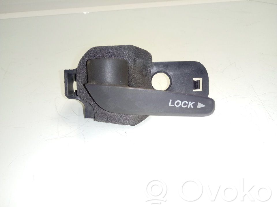 Manecilla interna puerta delantera