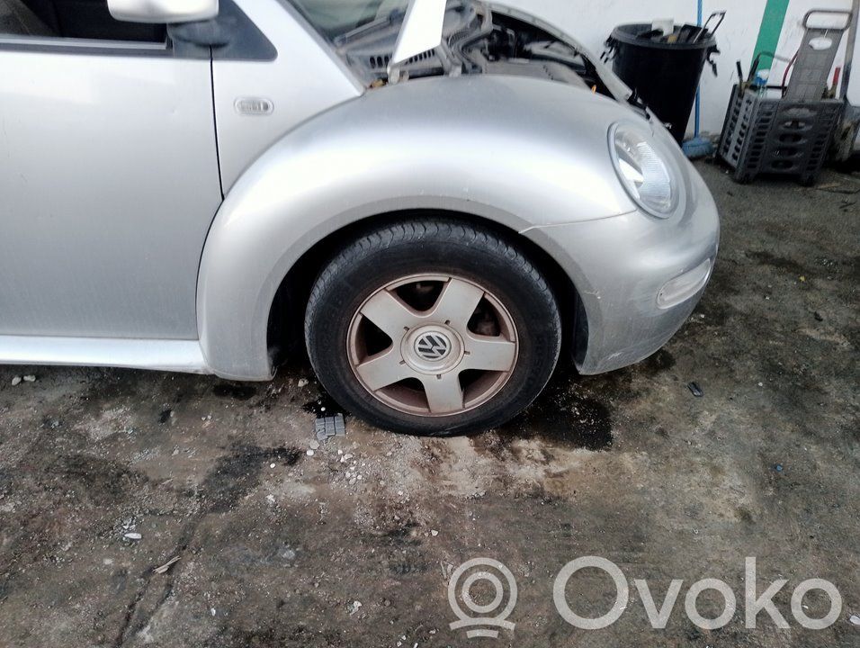 Volkswagen New Beetle Błotnik przedni 