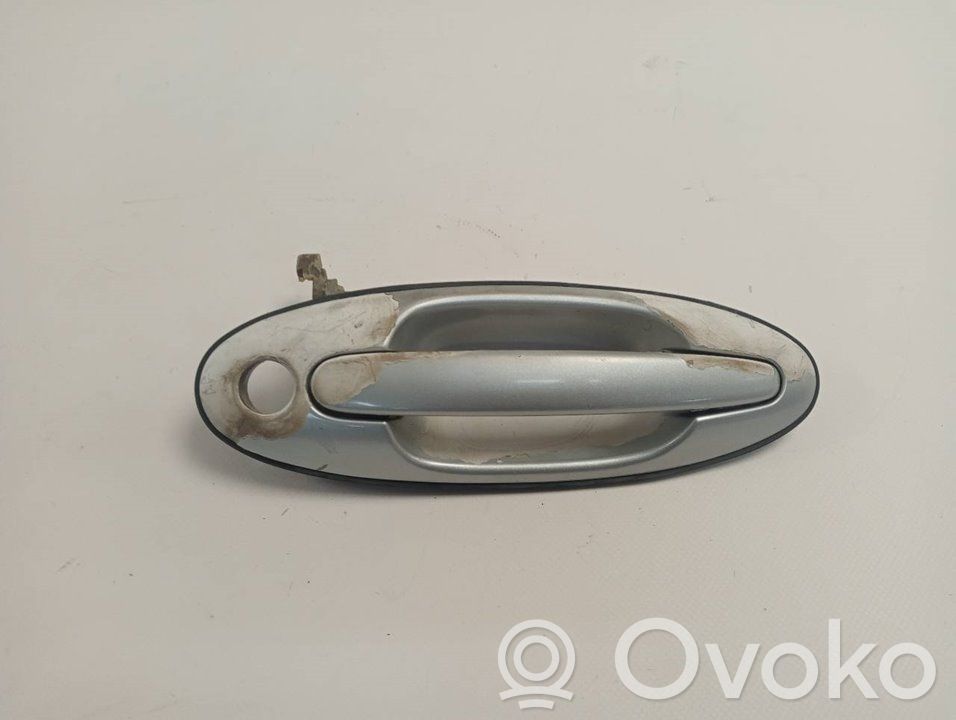 Manecilla externa puerta delantera