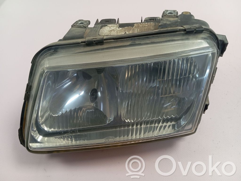 Scheinwerfer   8L0941029