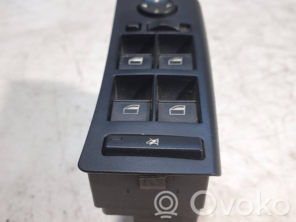 Electric window control switch   6944552