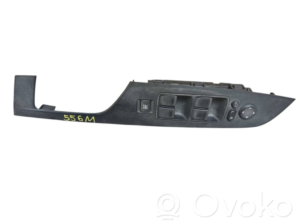 Mazda 6 Front door window switch trim 