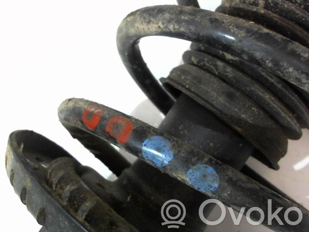 Volkswagen Polo Amortyzator osi przedniej ze sprężyną 