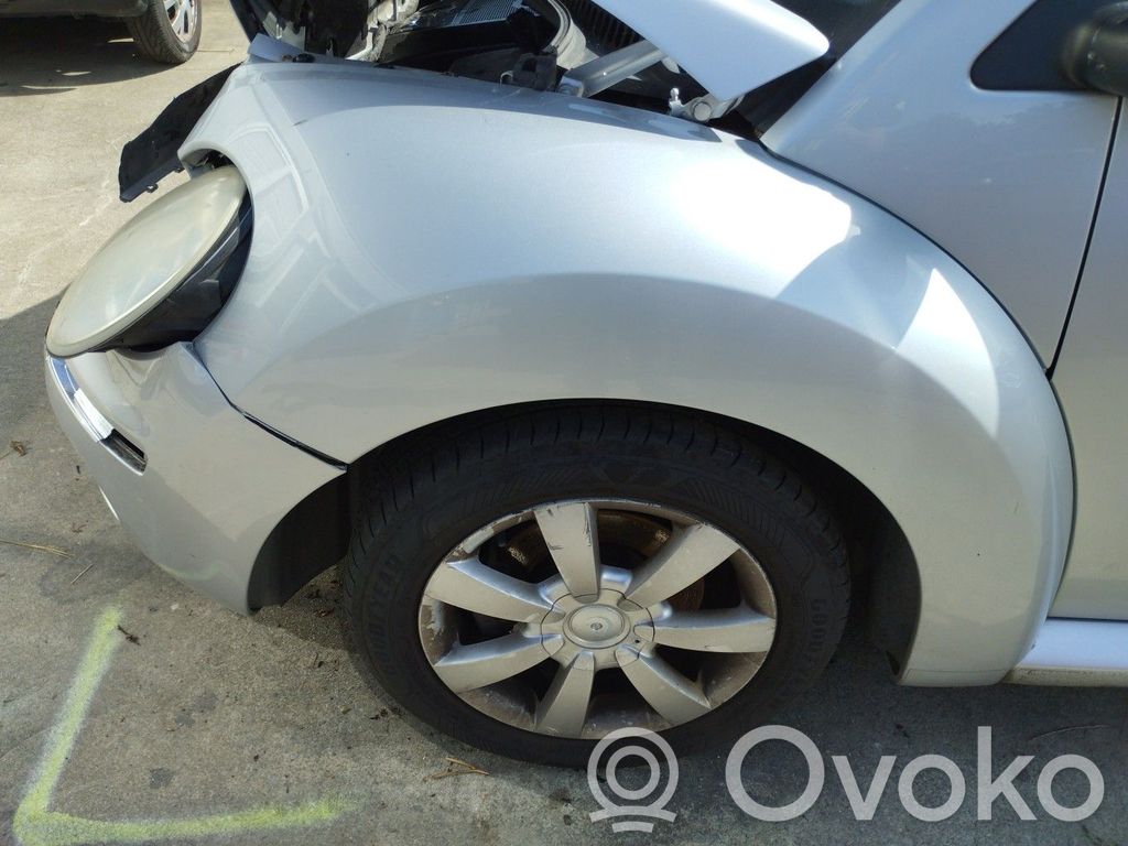 Volkswagen New Beetle Półoś przednia 