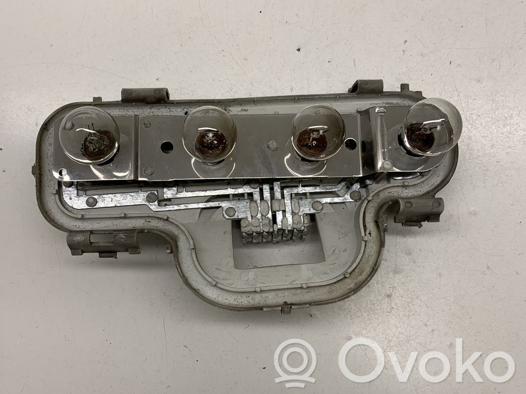 Opel Astra G Takavalon polttimon suojan pidike 