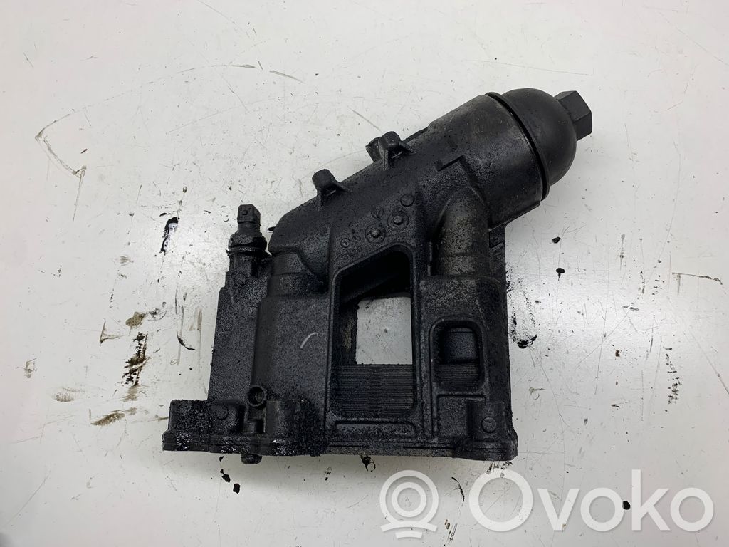 Oil filter mounting bracket   11427797392,7797392,51750610