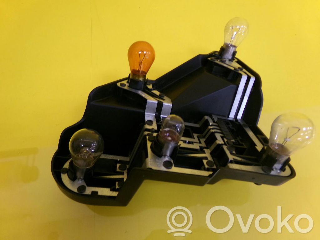 Rover 75 Takavalon polttimon suojan pidike 