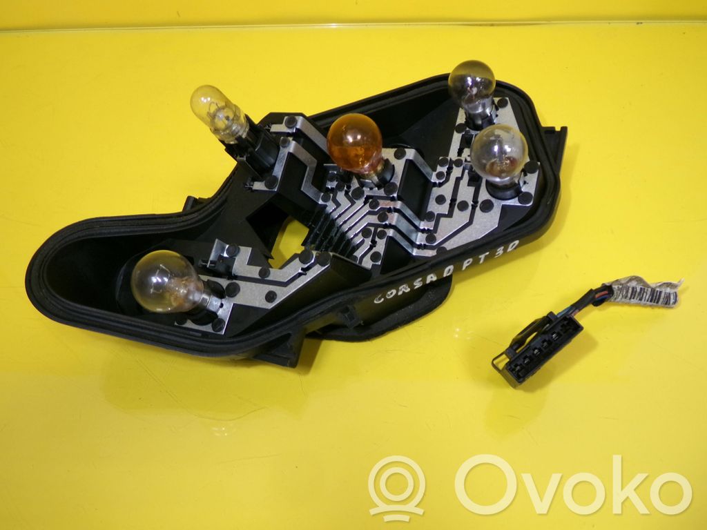 Opel Corsa D Takavalon polttimon suojan pidike 