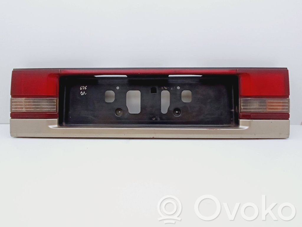 Mazda 626 Trunk door license plate light bar 