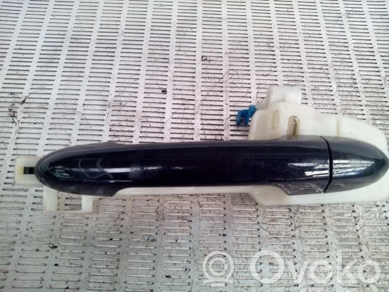 Manecilla externa puerta trasera