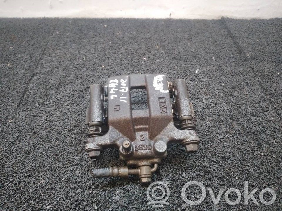 Nissan X-Trail T31 Supporto della pinza del freno posteriore 