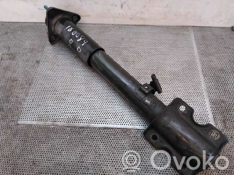 Front shock absorber with coil spring