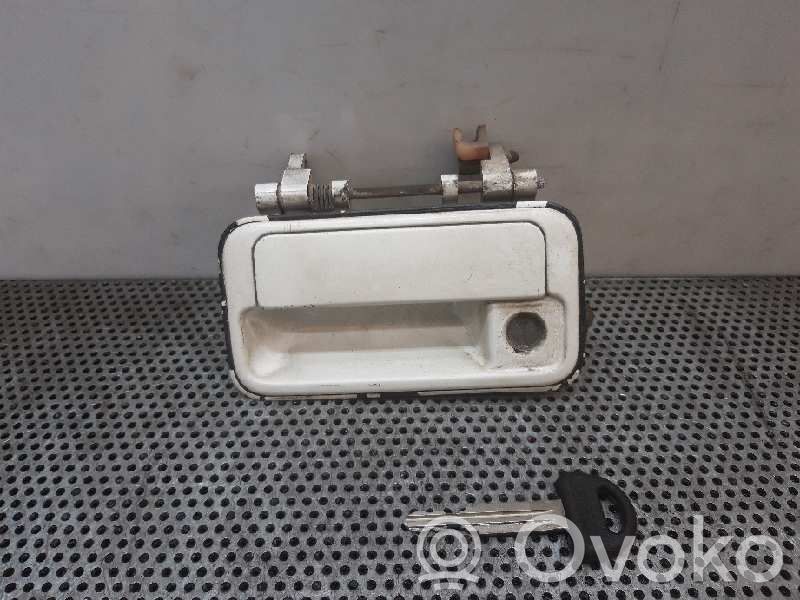 Manecilla externa puerta delantera