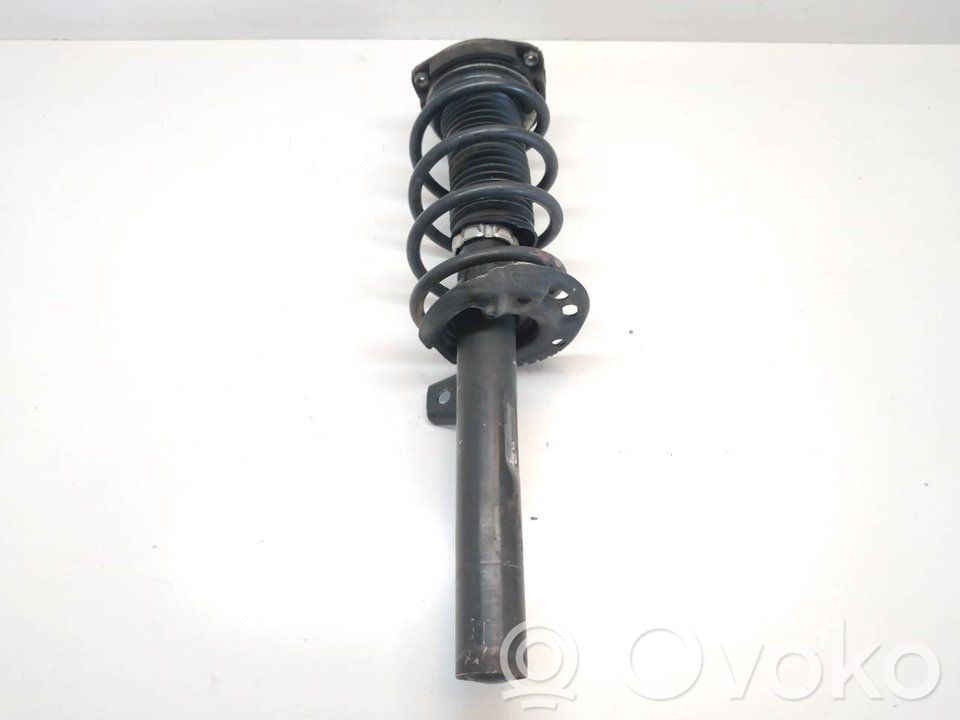 Front shock absorber with coil spring