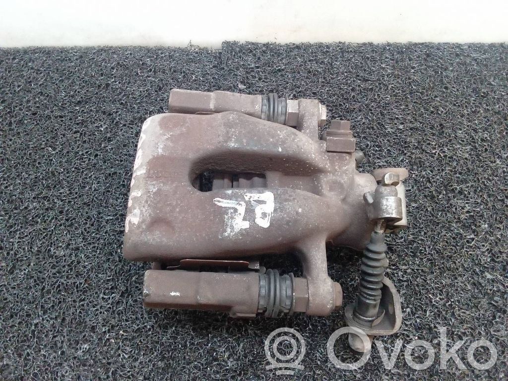 Opel Astra G Tylny zacisk hamulcowy 