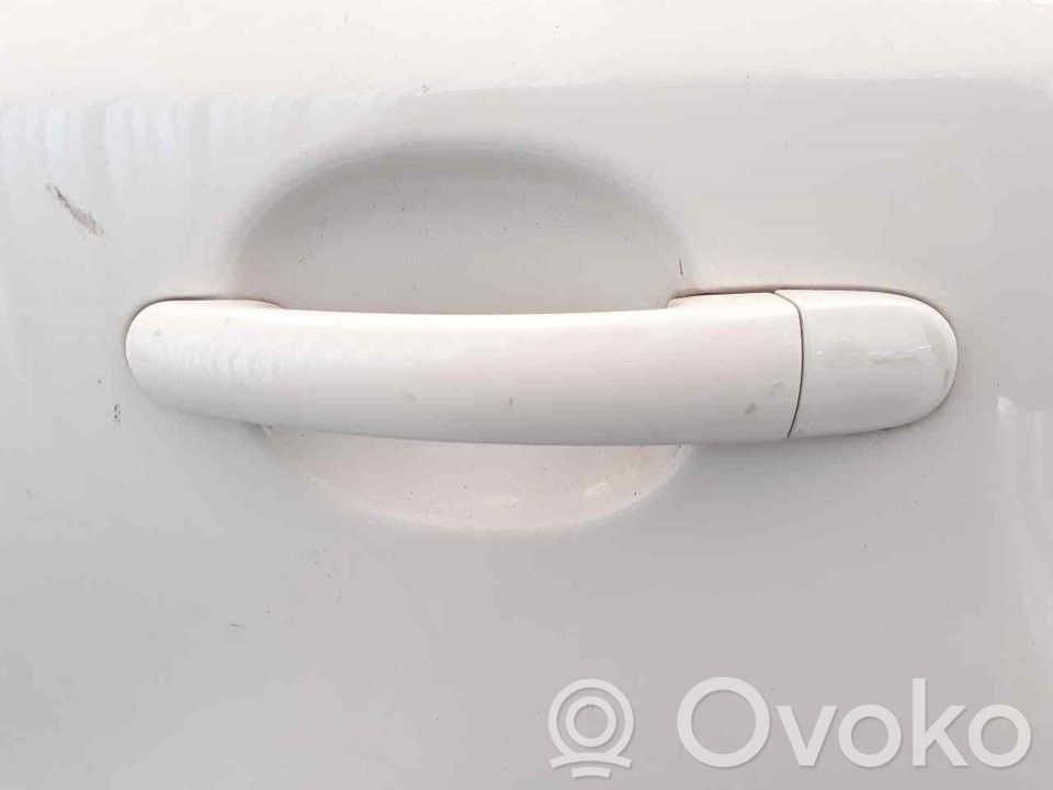Manecilla externa puerta trasera