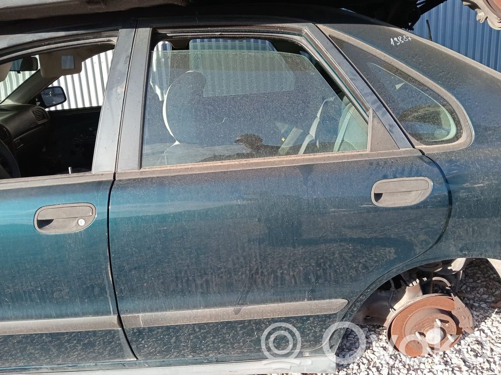 Regulador manual de la ventanilla trasera