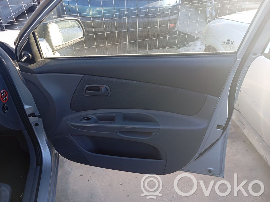 Regulador de puerta delantera con motor