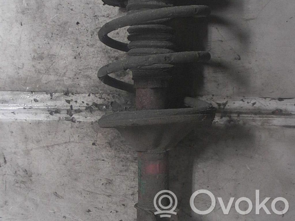 Front shock absorber with coil spring