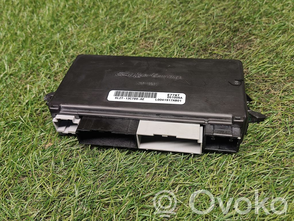 Seat control module   6L2T13C789AE