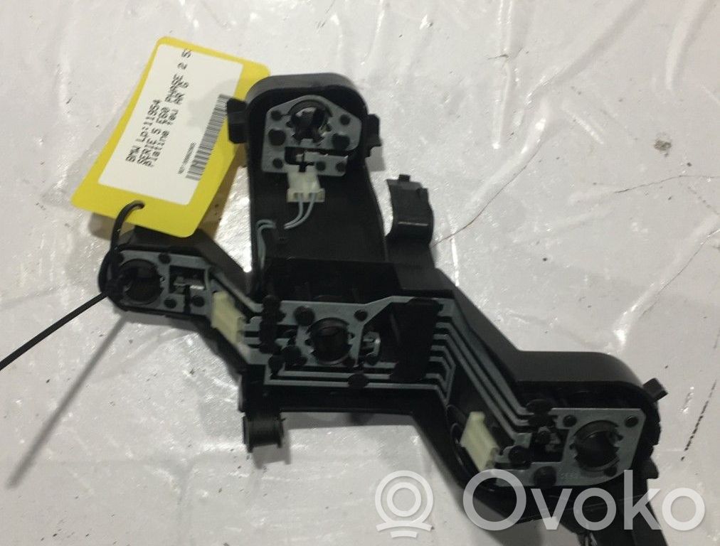 Tail light bulb cover holder