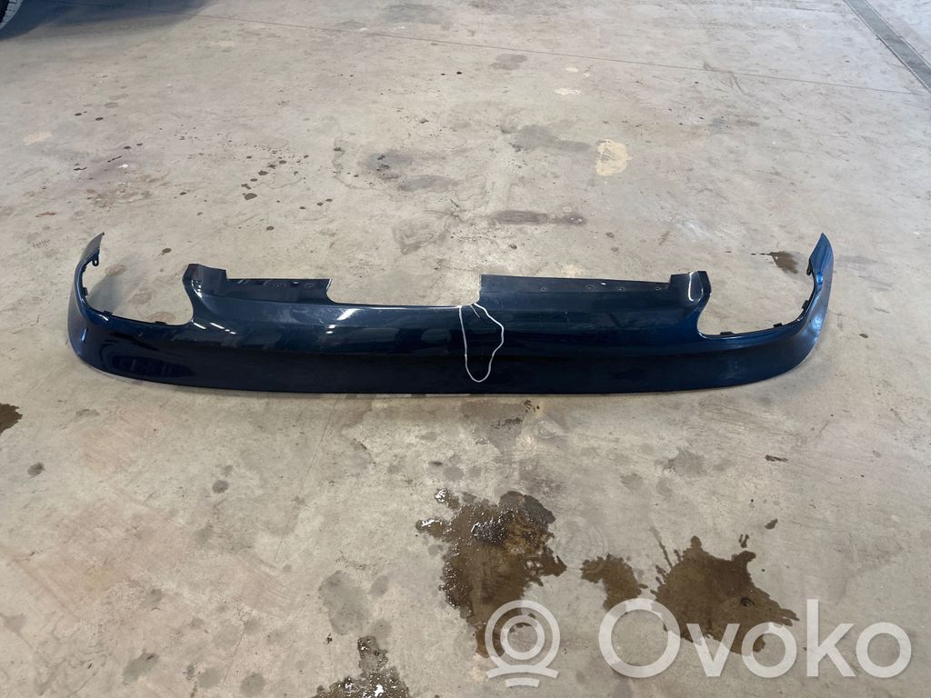 Volvo XC60 Moldura inferior del parachoques trasero 