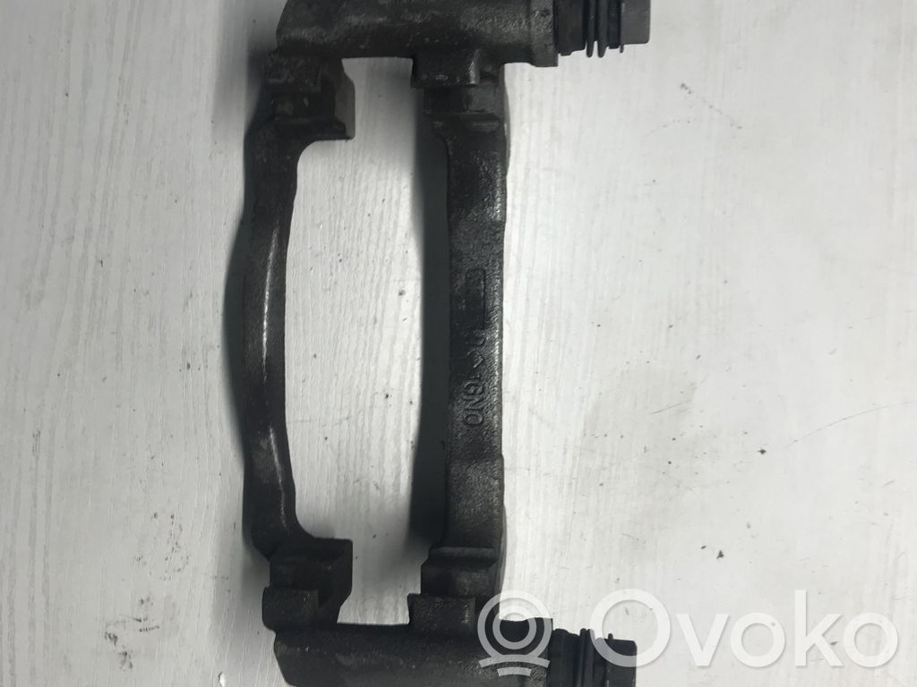 Volkswagen Golf VII Оковки тормозных колодок (перед) 