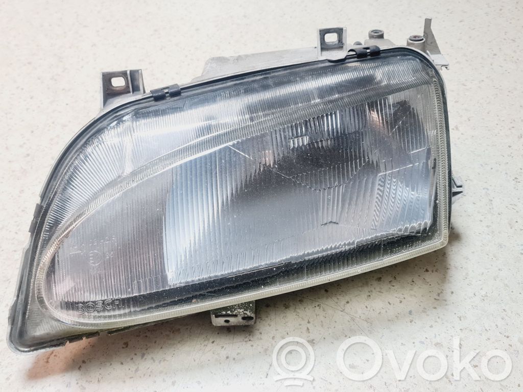 Headlight/headlamp   7M1941015E,95VW13005YA,0301048311